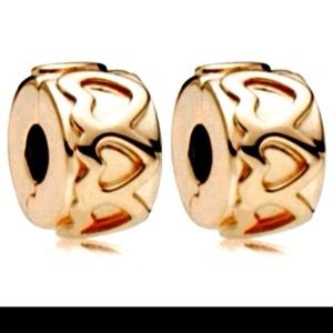 BRAND NEW PAIR of authentic Pandora charm clips " Heart row " Rosegold